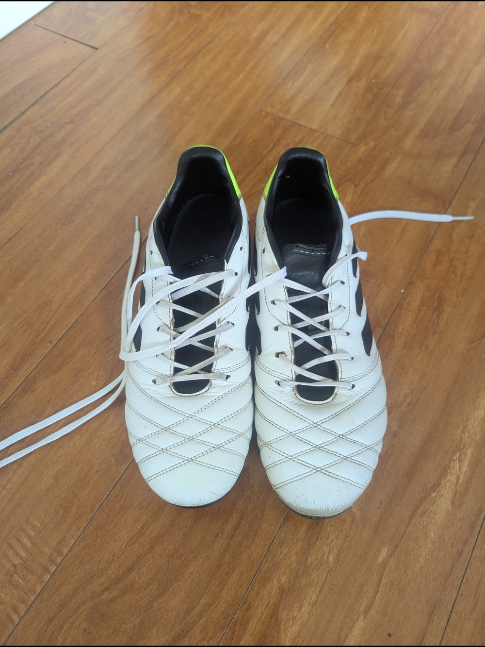 Men's White Athletic Lace-Up Soccer Cleats with Black Accents